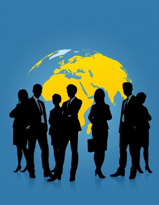 Businesspeople stand in front of a globe