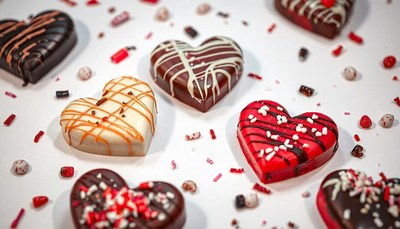Heart-shaped treats decorated with sprinkles