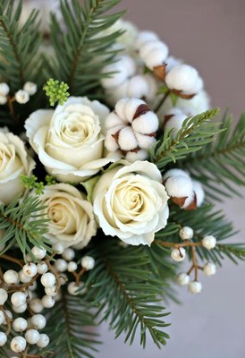 Elegant winter bouquet featuring white roses and cotton