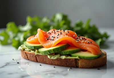 Healthy open-faced sandwich with salmon and cucumber