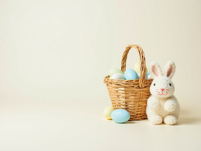Easter basket filled with colorful eggs and plush bunny
