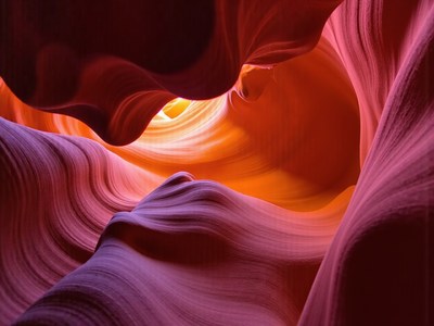 Colorful rock formations in antelope canyon at sunset