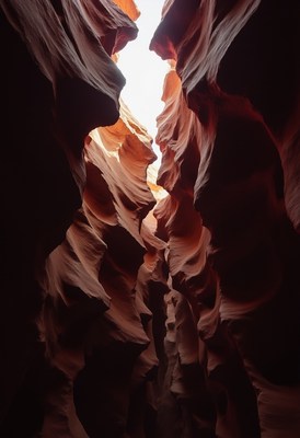 Unique rock formations in narrow canyon during daytime