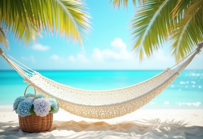 Relaxing hammock by the beach with flowers in basket