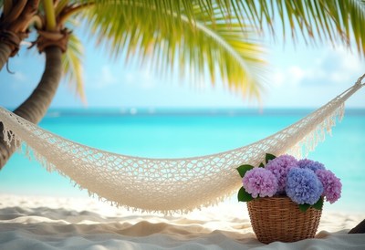 Relaxing hammock by the beach with flowers and palm trees