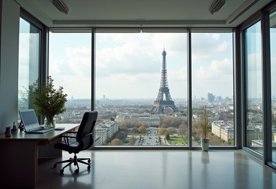 View of the eiffel tower from a modern office setting
