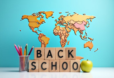 Colorful school supplies with a world map display