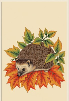 Hedgehog resting on autumn leaves in a natural setting