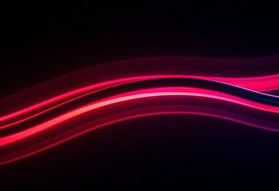 Colorful light waves create a dynamic visual effect