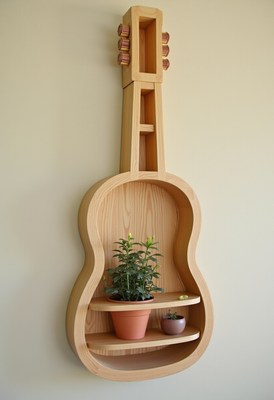 Unique guitar-shaped shelf displays potted plants