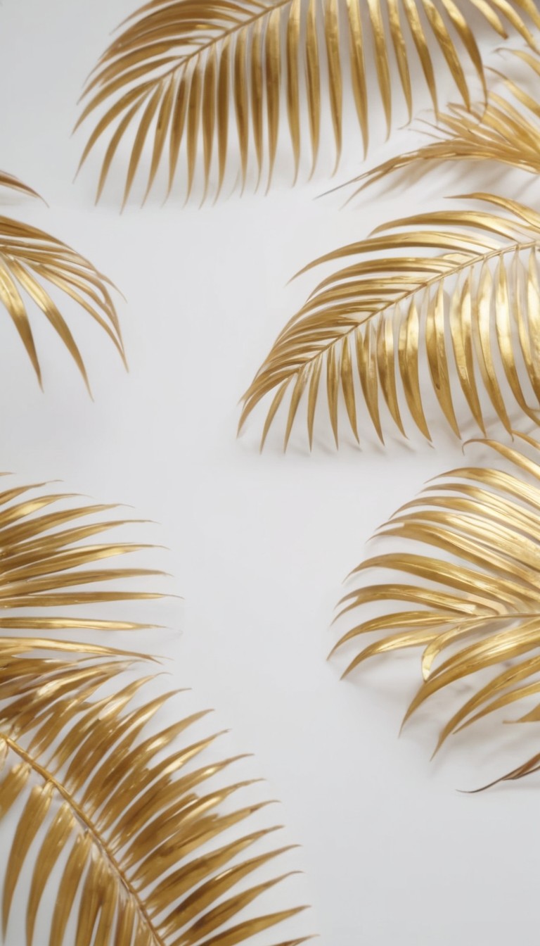 Golden palm leaves on white background Golden palm leaves on white background
