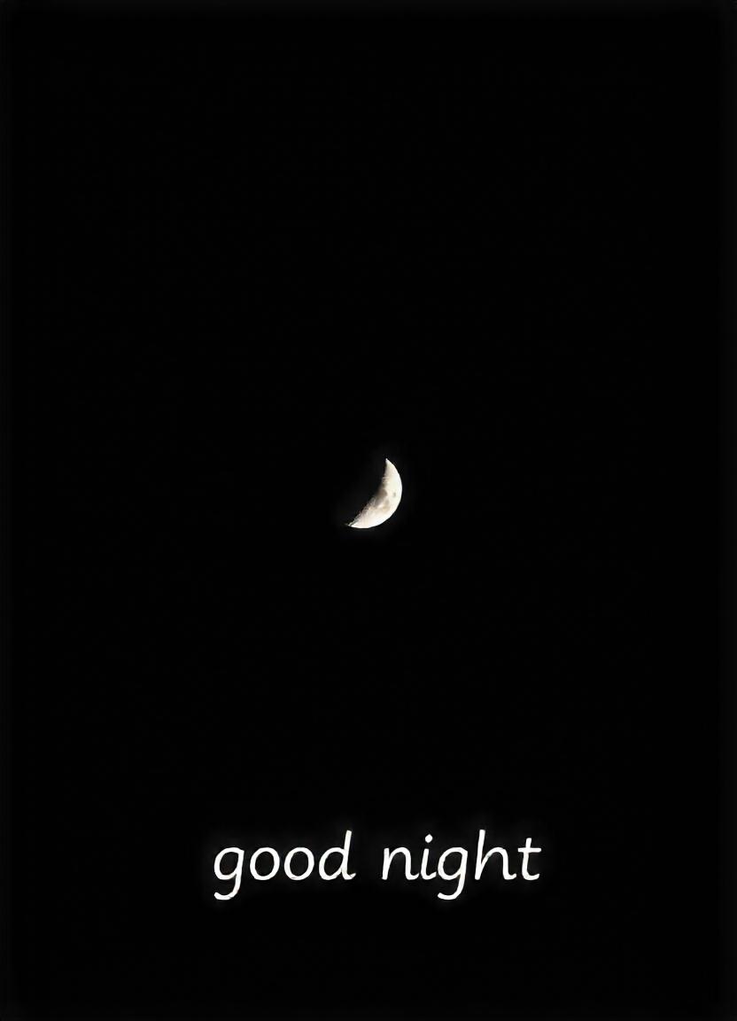 A crescent moon shines in the night sky A crescent moon shines in the night sky