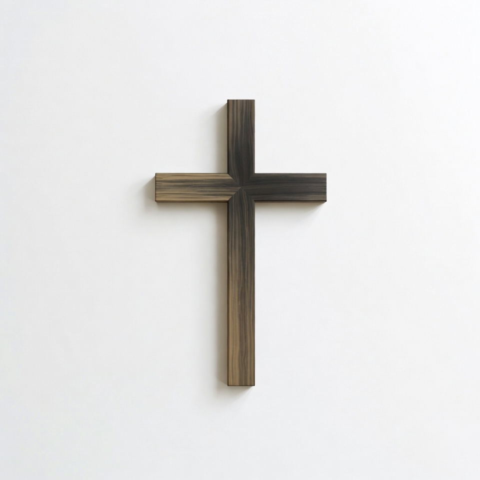 Wooden cross decor on a plain white wall Wooden cross decor on a plain white wall