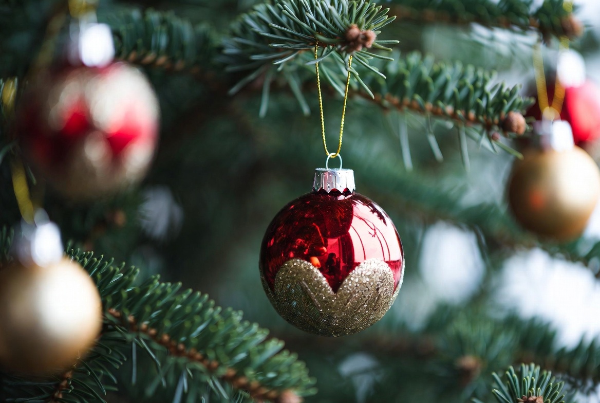 Red and gold christmas ornament on tree Red and gold christmas ornament on tree