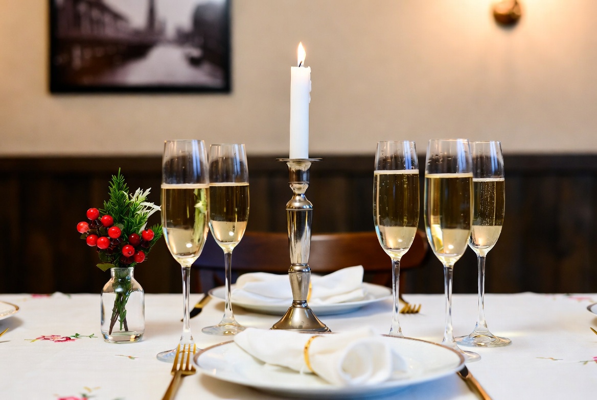 Elegant dinner table setting for celebration Elegant dinner table setting for celebration