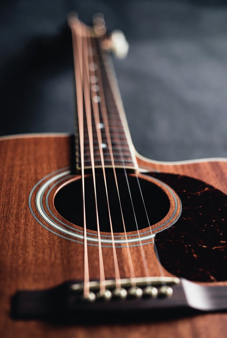 Close up of acoustic guitar strings Close up of acoustic guitar strings