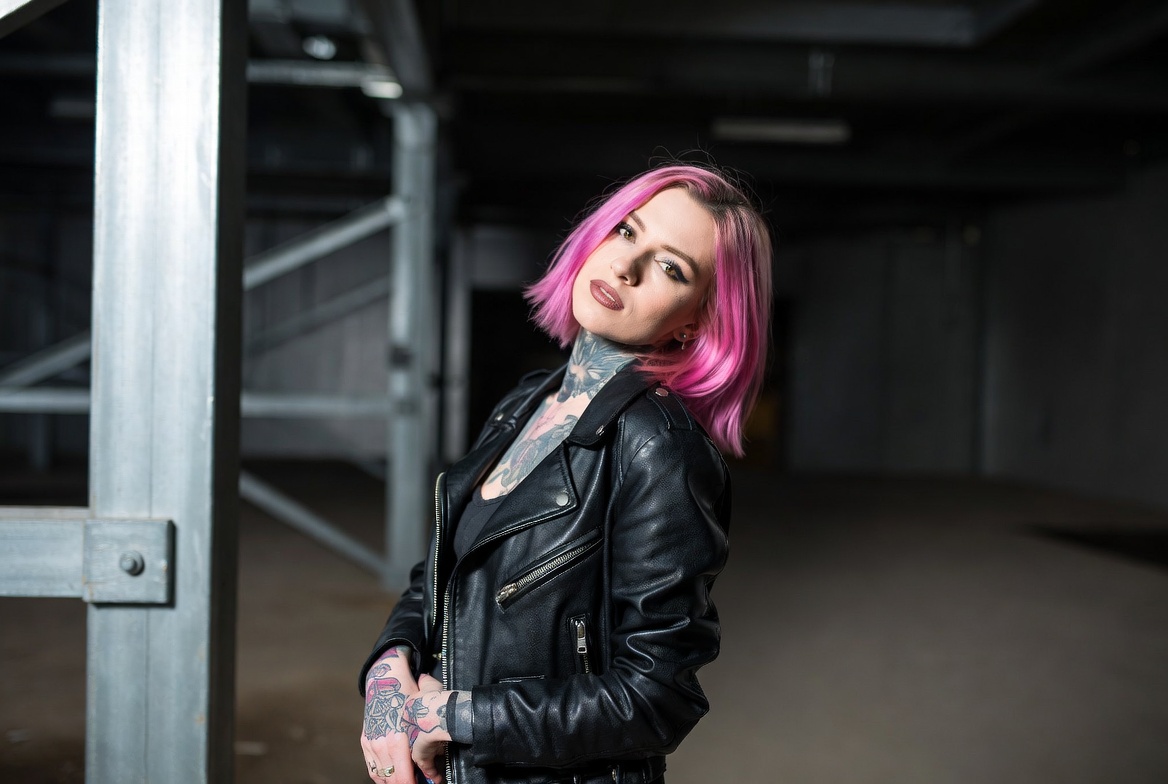 Woman with pink hair posing Woman with pink hair posing