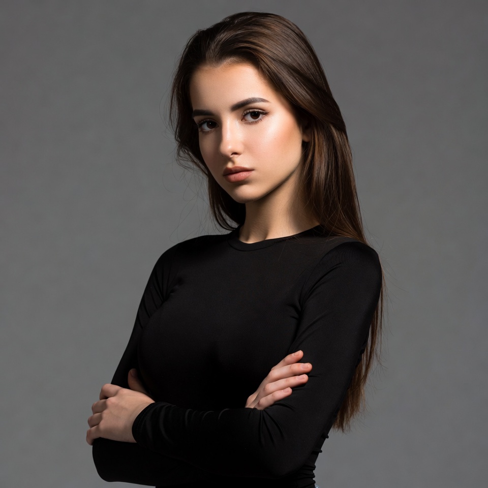 Model poses for a studio shoot Model poses for a studio shoot