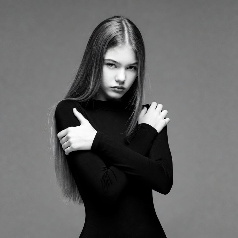 Young woman posing in black outfit Young woman posing in black outfit