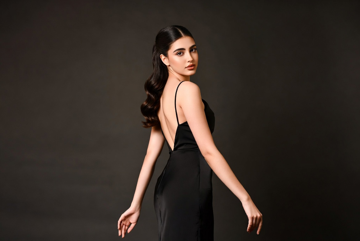 Model poses in black dress Model poses in black dress