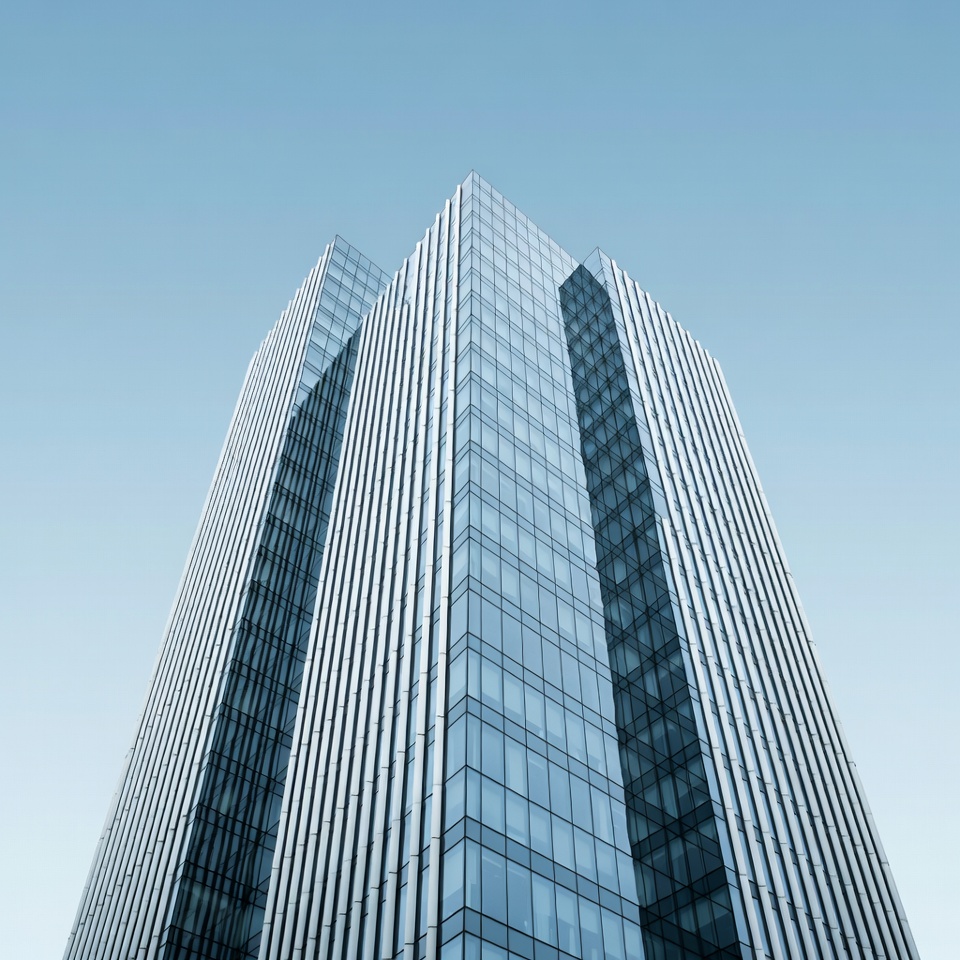 Modern glass building reaching sky Modern glass building reaching sky