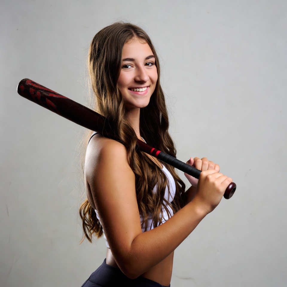 Young athlete poses with baseball bat Young athlete poses with baseball bat