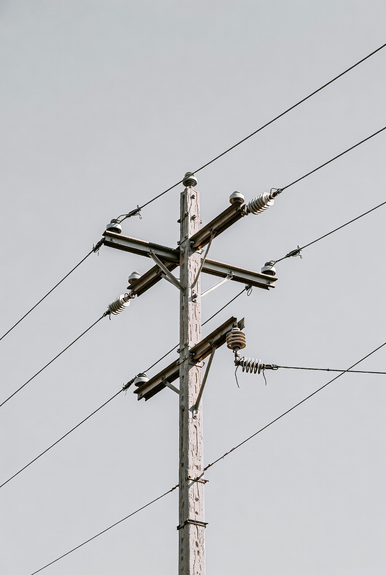 Utility pole and power lines scene Utility pole and power lines scene