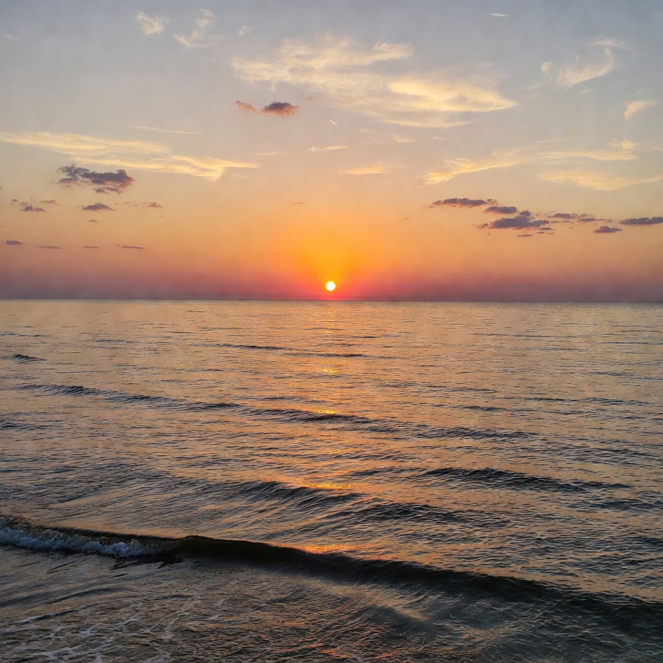 Sunset over the calm sea waters Sunset over the calm sea waters