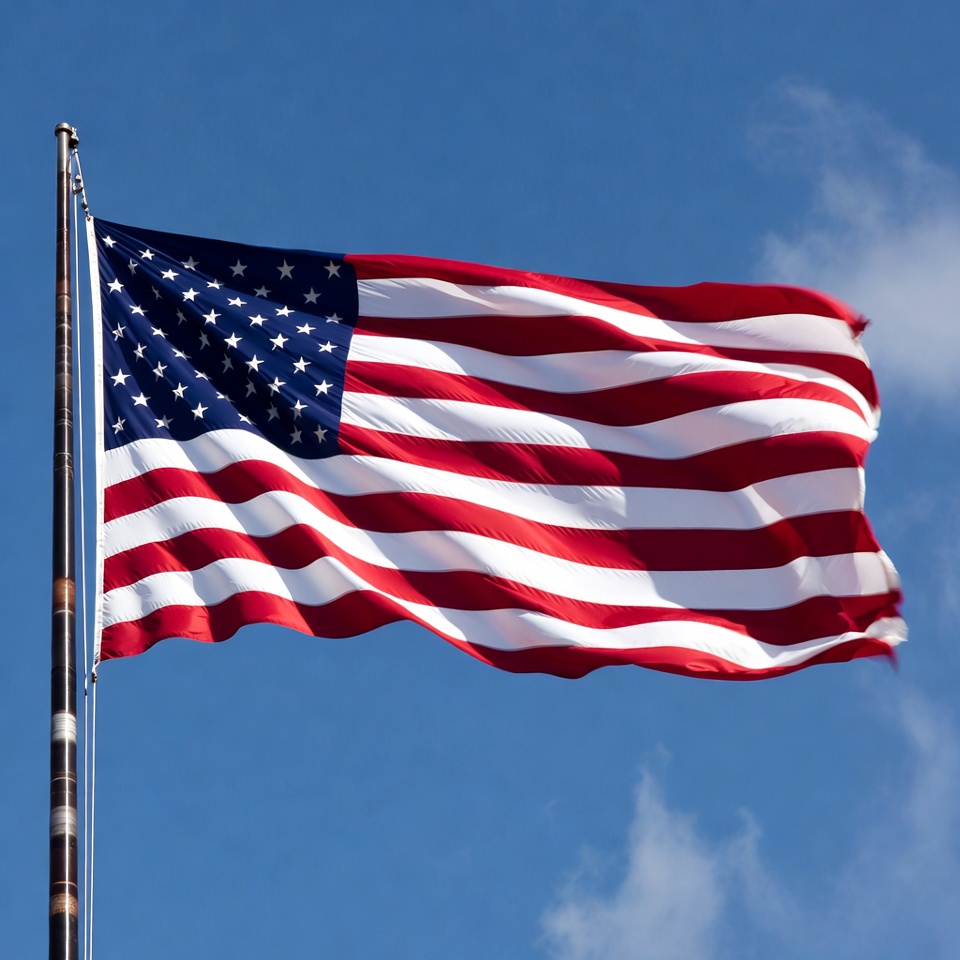 Waving flag against blue sky Waving flag against blue sky