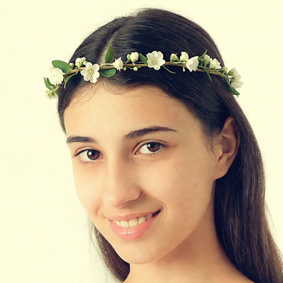 Girl with flower crown smiling Girl with flower crown smiling