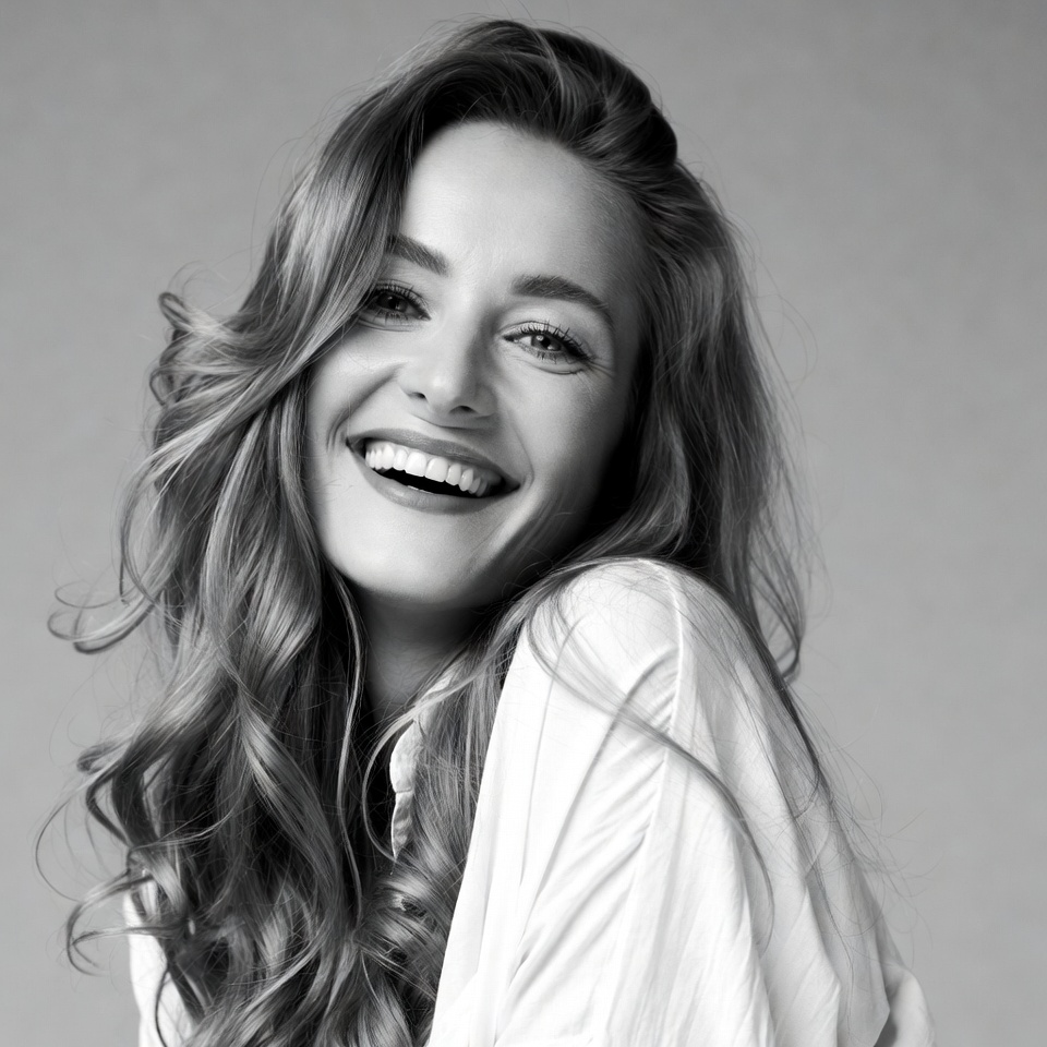 Woman smiling in casual setting Woman smiling in casual setting