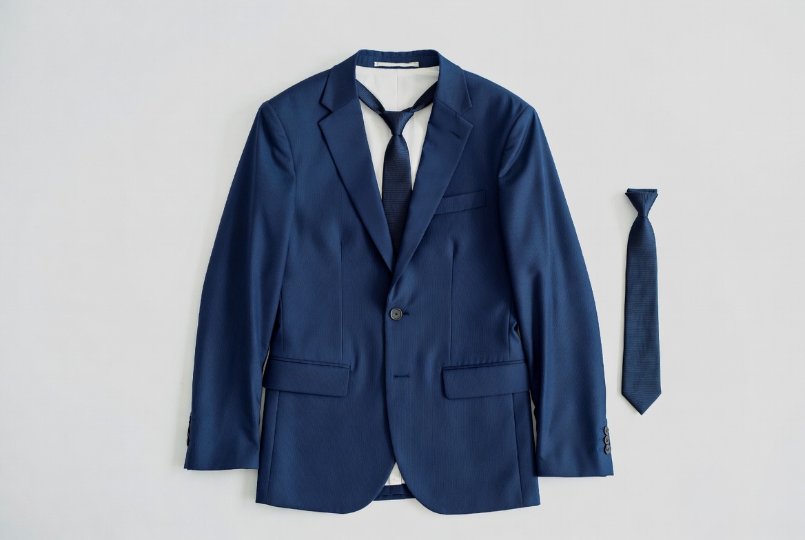 Suit laid out for formal event preparation Suit laid out for formal event preparation