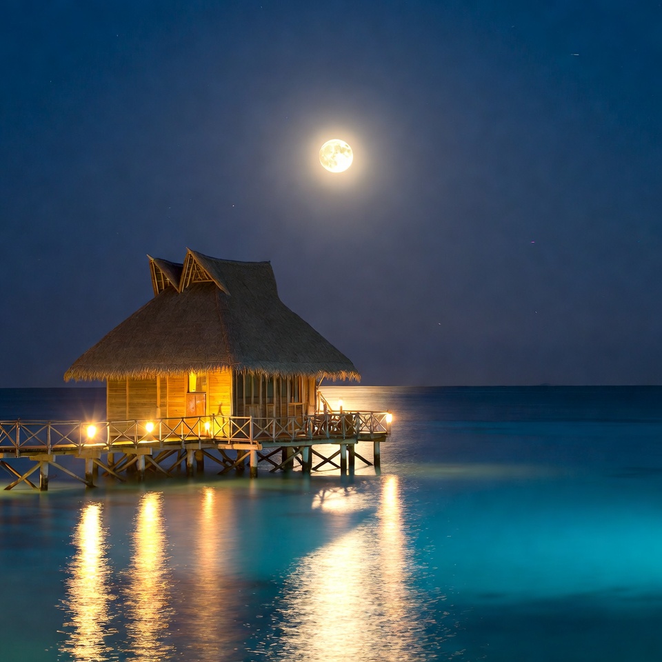 Moonlight on a beach house Moonlight on a beach house