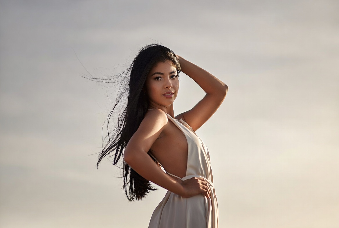 Model posing outdoors with wind Model posing outdoors with wind