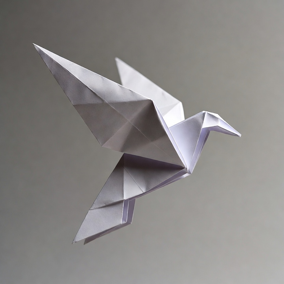 Crafting a paper bird in motion Crafting a paper bird in motion