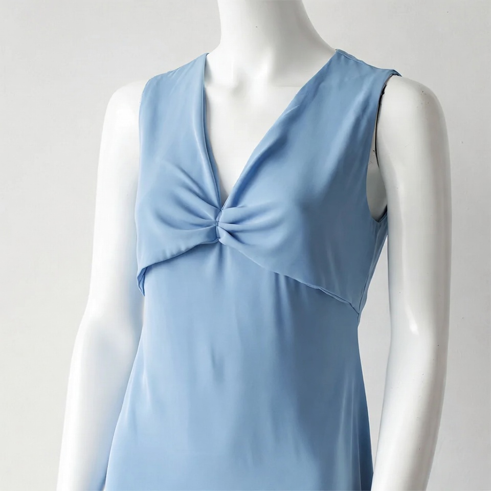 Blue dress displayed on a mannequin Blue dress displayed on a mannequin