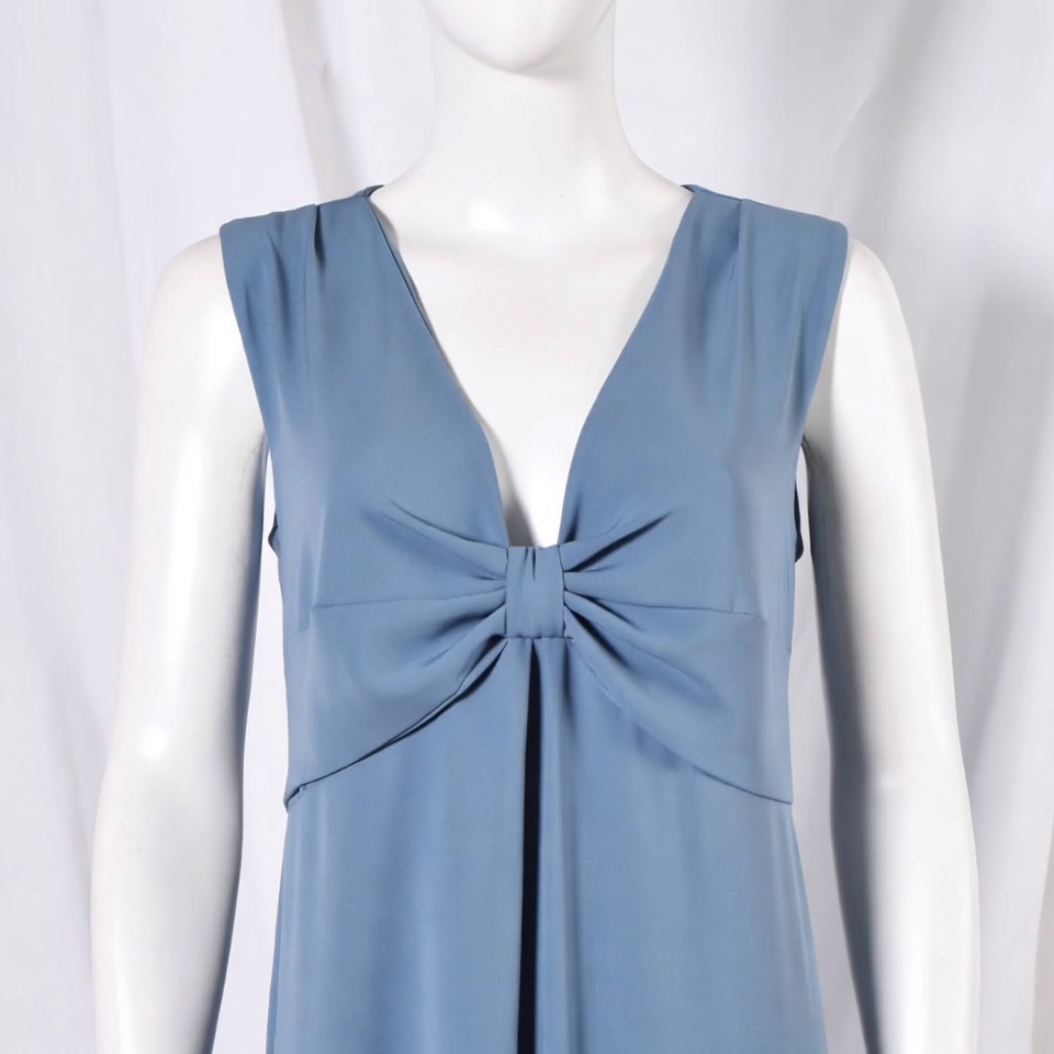 Dress displayed on mannequin with bow detail Dress displayed on mannequin with bow detail