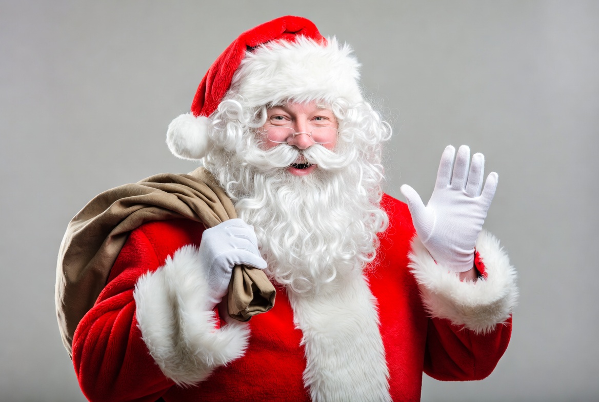 Santa claus stands with sack Santa claus stands with sack