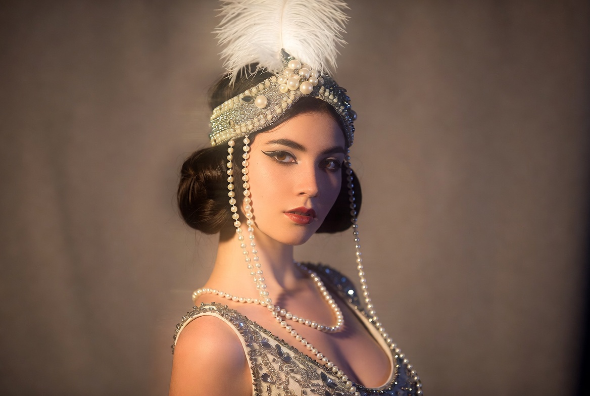 Girl in flapper style costume with pearls Girl in flapper style costume with pearls