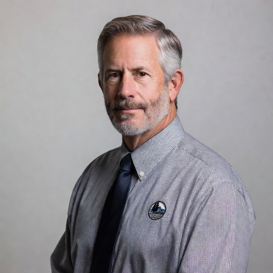 Man in checkered shirt with beard Man in checkered shirt with beard