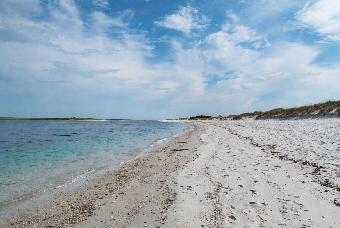 Quiet sandy beach under blue sky Quiet sandy beach under blue sky