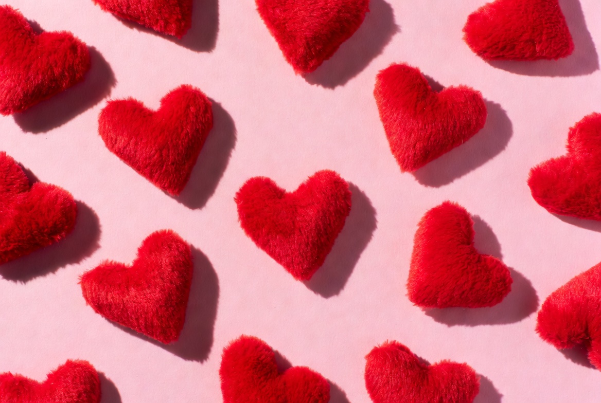 Soft red hearts on light background Soft red hearts on light background
