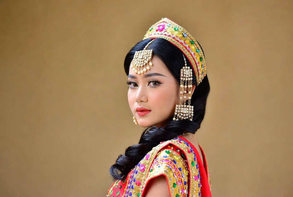 Woman in traditional dress posing Woman in traditional dress posing