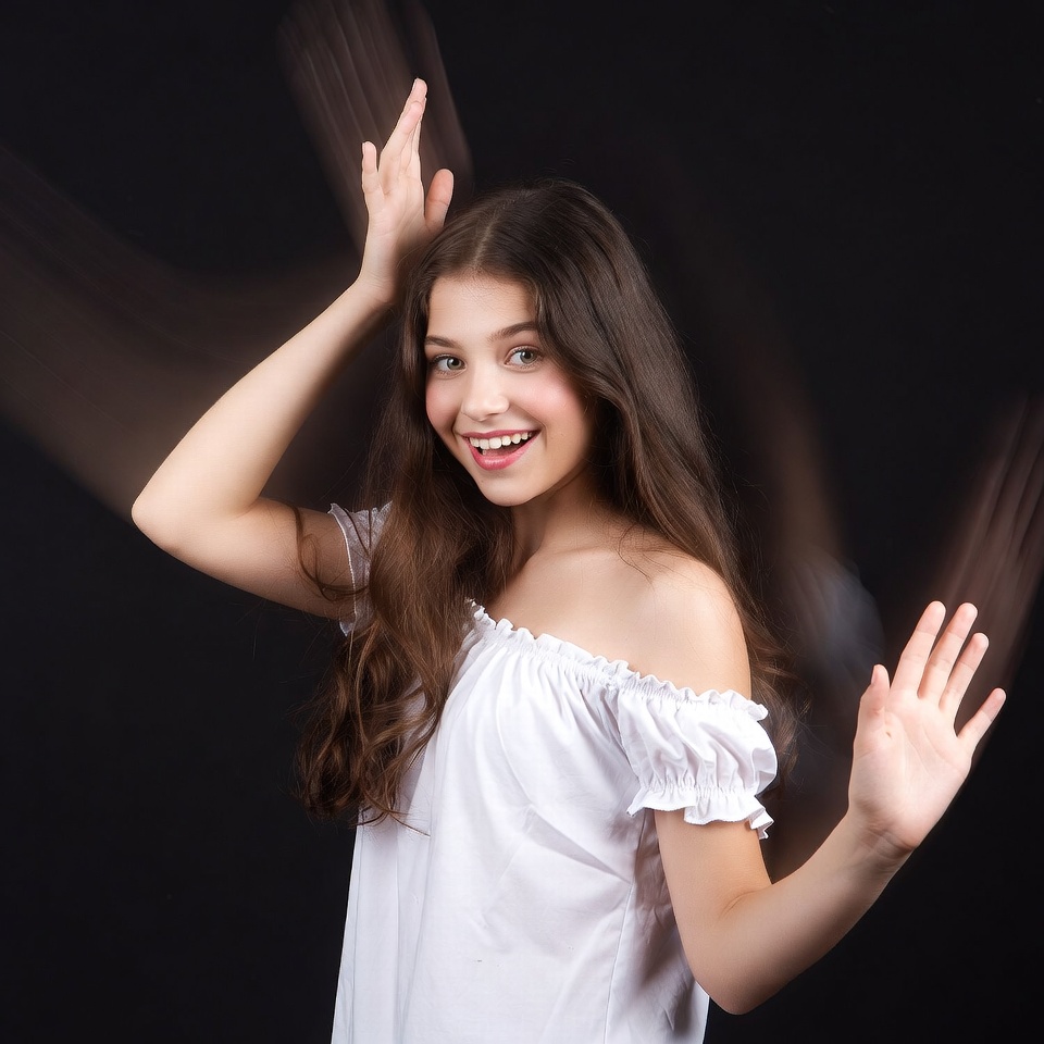 Girl with hands raised in motion Girl with hands raised in motion