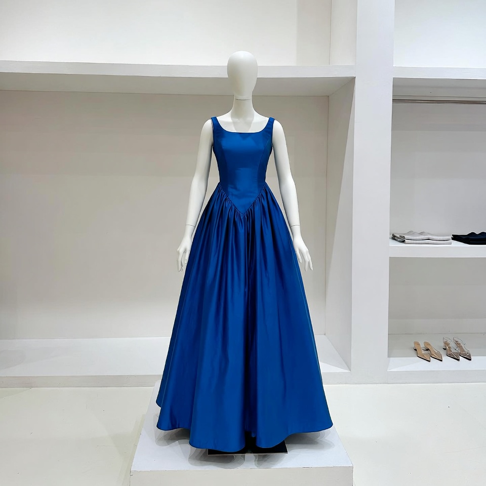 Stylish blue dress displayed in store Stylish blue dress displayed in store