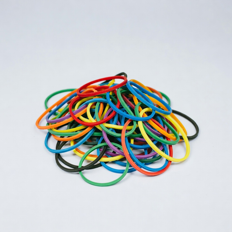 Colorful rubber bands on white background Colorful rubber bands on white background