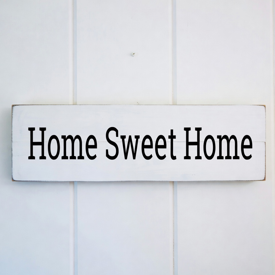 Home sign on wall in indoors Home sign on wall in indoors