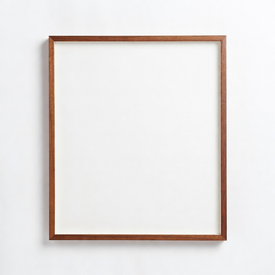 Empty picture frame on white wall Empty picture frame on white wall