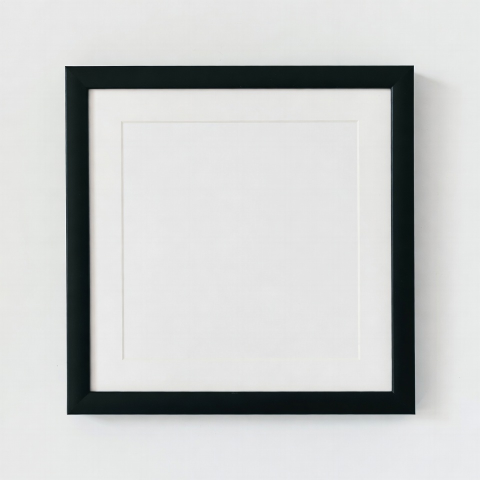 Empty frame on white wall Empty frame on white wall