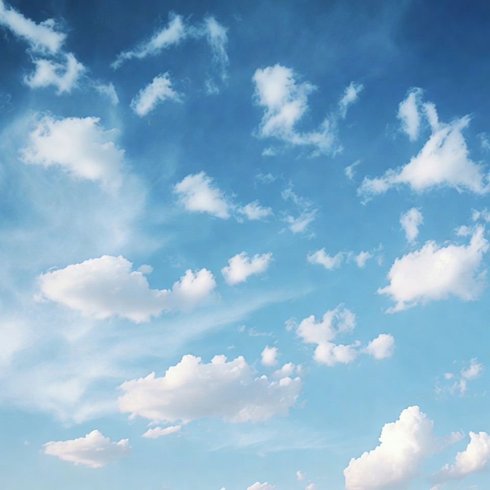 Clouds in a bright blue sky Clouds in a bright blue sky